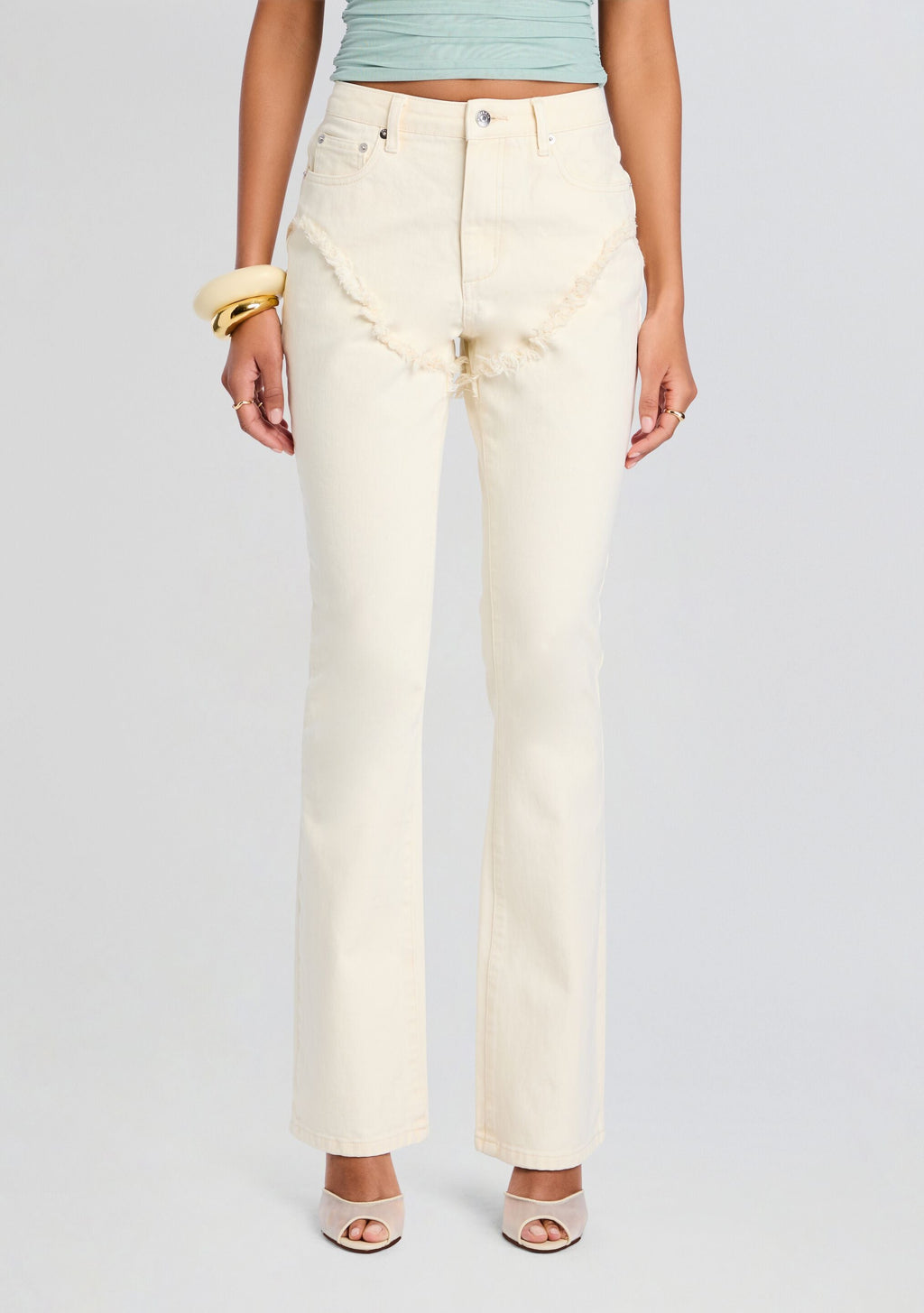 Dahlia Frayed Bootcut Jean by SEROYA in Eggshell, product image 1